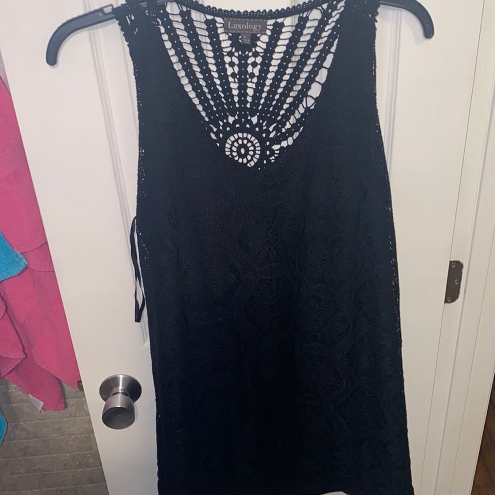 Large (fits like XL) Black Dress. Cut out design in back. Worn a few times.
